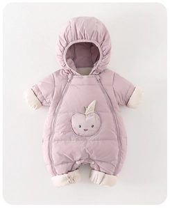 Close-up of double zipper closure and cute apple embroidery on baby winter romper