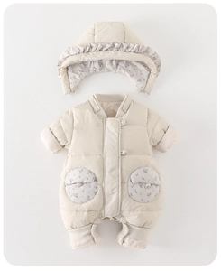 Detail of baby down romper with floral lining and snap buttons for winter warmth