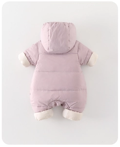 Detail of pink baby winter puffer romper showing horizontal quilting and ribbed cuffs