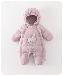Detail of baby down romper featuring cute apple embroidery and double zipper closure