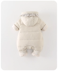 Detail of baby winter romper hood with floral ruffle trim and thick padded fabric