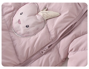 Detail of pink quilted baby down jacket showing cartoon apple embroidery and zipper