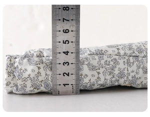 Detailed view showing the 4.5cm thickness of the padded floral toddler winter jacket