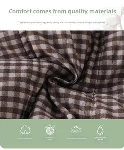 Detail of high-density brown checkered fabric with soft texture and anti-pilling finish