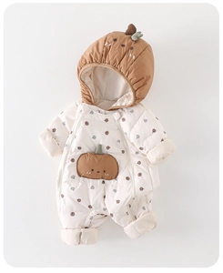 Detail of baby winter jumpsuit with cute pumpkin hood and soft ribbed cuffs