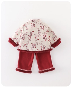 Close-up of traditional Chinese New Year outfit for girls with faux fur trim and floral pattern