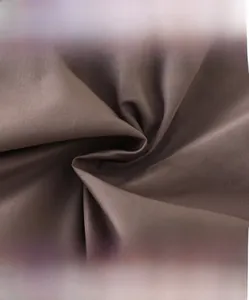 Détail de la texture du tissu marron haute densité, doux et respirant
