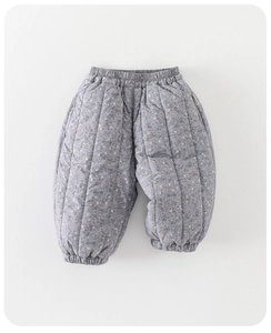 Detail view of quilted floral baby trousers featuring elastic waist and warm fleece lining