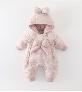 Detail of baby winter floral down jumpsuit with bow hood and double zipper closure