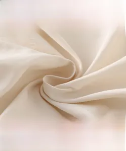 Macro shot of high-density soft off-white fabric for baby winter down jacket lining