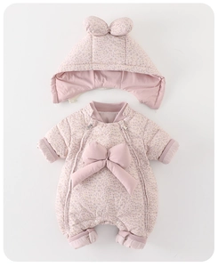 Detail of baby winter floral down romper with bunny ears hood and a 3D bow accent