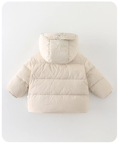 Detail view of the soft beige baby winter jacket back with minimalist hood lettering