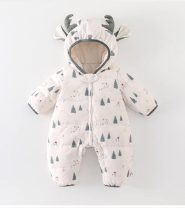 Detail of baby winter padded jumpsuit with reindeer hood and nordic forest prints