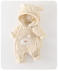 Close-up of quilted winter baby romper with cute bear ears and soft fleece lining