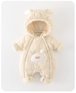 Detail of baby winter romper showing ruffled front pocket with 3D ears and quilted texture