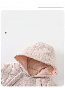 Detail view of thickened floral baby romper with hood and soft quilted lining for winter