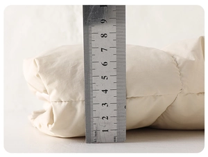 Detailed view measuring the 8.5cm thickness of the warm winter padded baby down jacket