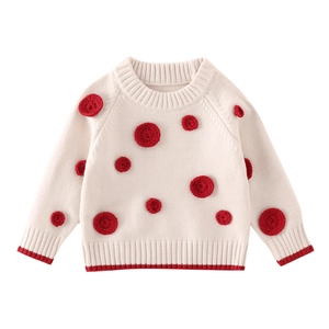Winter toddler girl sweater in off-white with red 3D polka dots and ribbed trim details