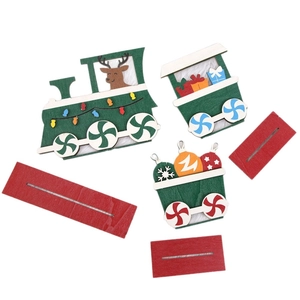 Wooden Christmas train set with green locomotive and red gift carriages for desk decoration
