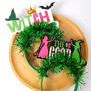 Wicked Witch themed party headbands with green glitter letters and decorative wizard hats