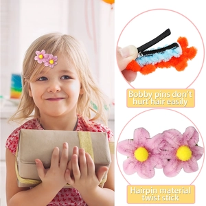 Detail showing plush flower hairpin texture and safety design for kids hair styling