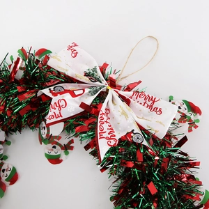Christmas bow wreath with red green sequins, Merry Christmas ribbon and snowman charms