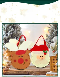 Detail of Christmas felt gift bags featuring cute reindeer and Santa Claus designs