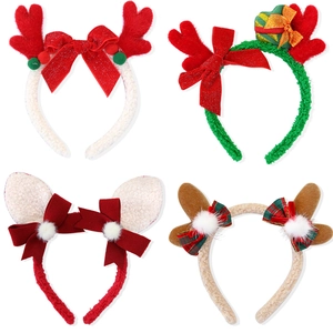 Collection of four festive Christmas plush antler headbands with bows and glitter details