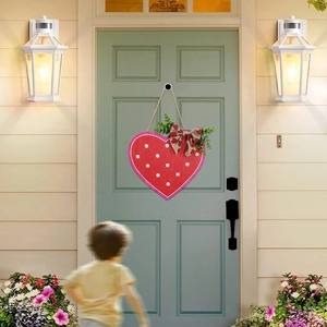 Romantic heart-shaped wooden door plaque with red polka dots and burlap bow decor