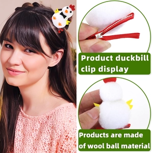 Detail of cute plush chick hair clip featuring white wool ball and red duckbill clip