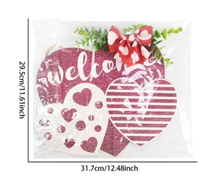 Detail of wooden heart welcome sign for Valentine's Day or wedding hanging decor