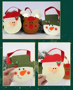 Detailed view of Christmas felt gift bags featuring Santa, Reindeer and Snowman patterns