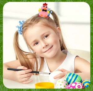 Pink plush chick hair clip with red crest and yellow wings worn by a young girl