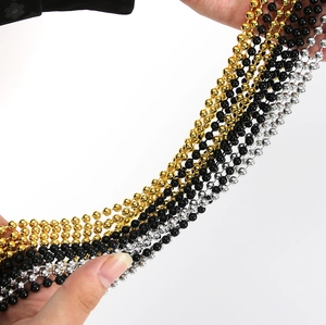 Black gold and silver beaded party necklaces made of polished plastic for festive events