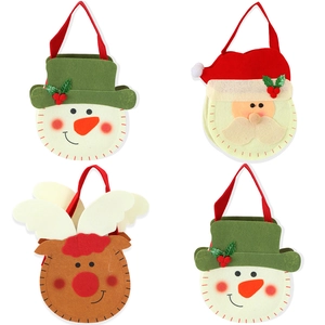 Set of 4 Christmas felt candy bags featuring snowman, Santa, and reindeer designs