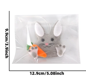 Felt Easter bunny pendant with carrot and ribbon, measuring 9.9cm by 12.9cm in size