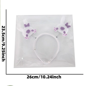 Easter bunny ears headband with white plush rabbits and purple dot ribbon details