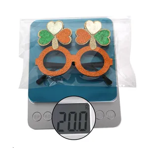 Mesure du poids de 20g pour la monture de lunettes pailletées trèfle Saint-Patrick