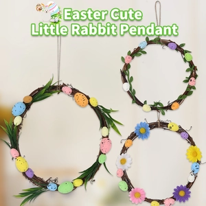 Easter vine wreaths set with colorful speckled eggs, green leaves and daisies for decor