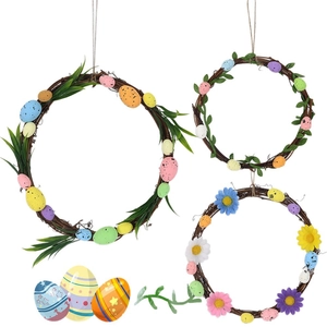 Easter decorative wreath set with colorful speckled eggs and artificial flowers on rattan base