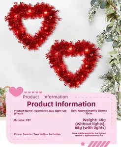 Detail showing red PET glowing heart wreath with LED light cable and battery pack