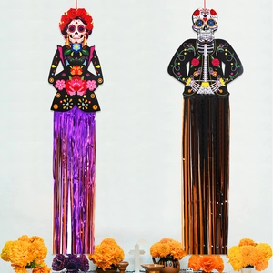 Detailed Day of the Dead hanging decorations with La Catrina motifs and colorful tassels