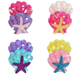 Mermaid seashell and starfish hair clips in four bright colors for girls' parties