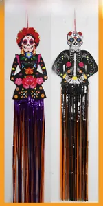 Detail of Day of the Dead skull banners with colorful floral patterns and long tassels