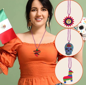 Detail of Cinco de Mayo necklaces with chili, skull, and pinata pendants on purple beads