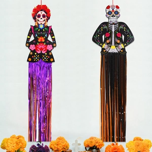 Day of the Dead skeleton hanging ornaments with colorful foil tassels for festive decor