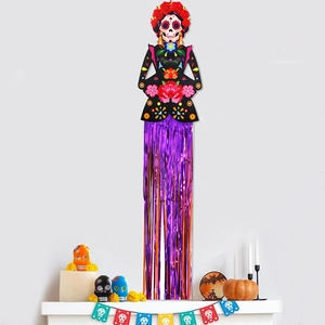 Dia de los Muertos La Catrina skull decoration with long purple metallic tinsel fringe