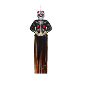 Day of the Dead skeleton decoration with colorful floral patterns and orange-black fringes