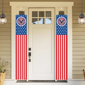 Independence Day porch banners with eagle emblem and stars and stripes hanging on a door