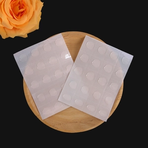 Detail of transparent double-sided glue dots for birthday balloon party decoration